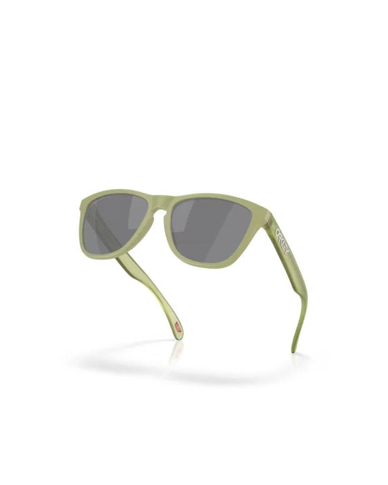 Sunglasses with gold frame and dark lenses on a white background
